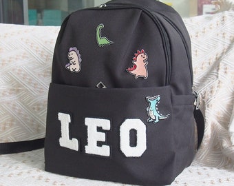 Petit sac à dos personnalisé en nylon pour garçon d'âge préscolaire avec joli patch T-rex pour la maternelle, meilleur cadeau d'anniversaire de dinosaure