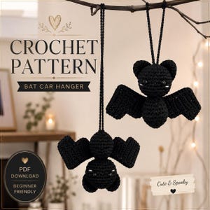 May include: Two black crocheted bat car hangers with black hanging cords. The text reads CROCHET PATTERN BAT CAR HANGER, PDF DOWNLOAD BEGINNER FRIENDLY, and Cute & Spooky. The bats feature small black eyes and white stitched details on the face.
