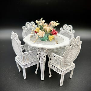 White Wire Table and Chairs with Floral Centerpiece. Please Reqd Description. Dollhouse Scale 1:12.