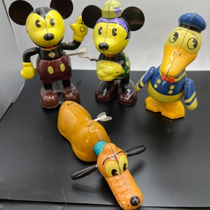 1980-1990 Disney Young Epoch Metal Wind Up Toy Set- Lot of 4