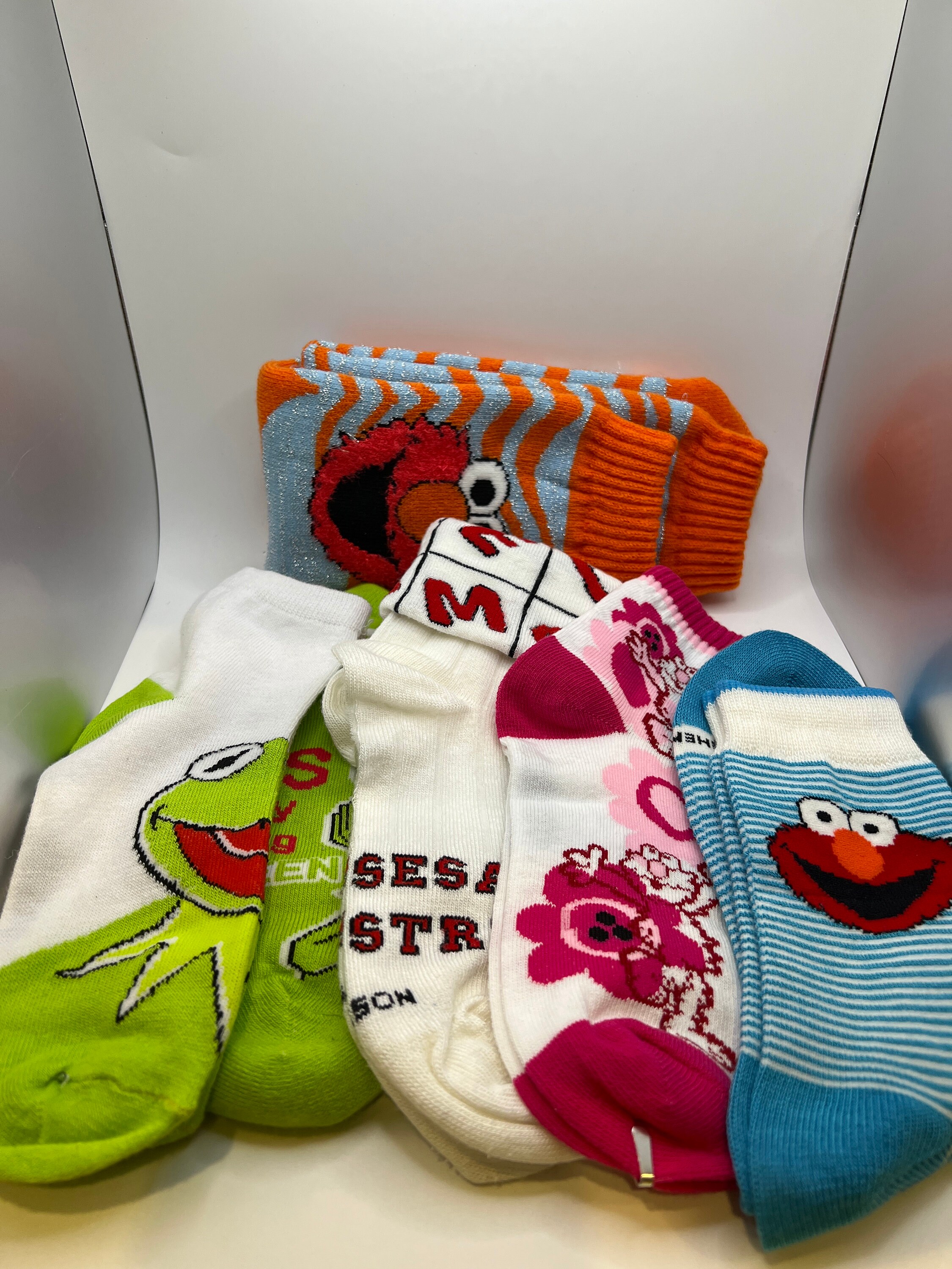 Sesame Street Elmo Boys Girls Multi Pack Crew Socks with Grippers (4-5T,  Abby Zoe 6 pk)