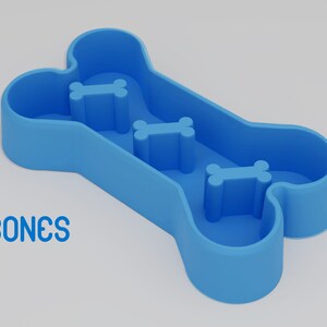 May include: Blue plastic dog bowl shaped like a bone with three smaller bone-shaped indentations. "3 BONES" is printed below the bowl.