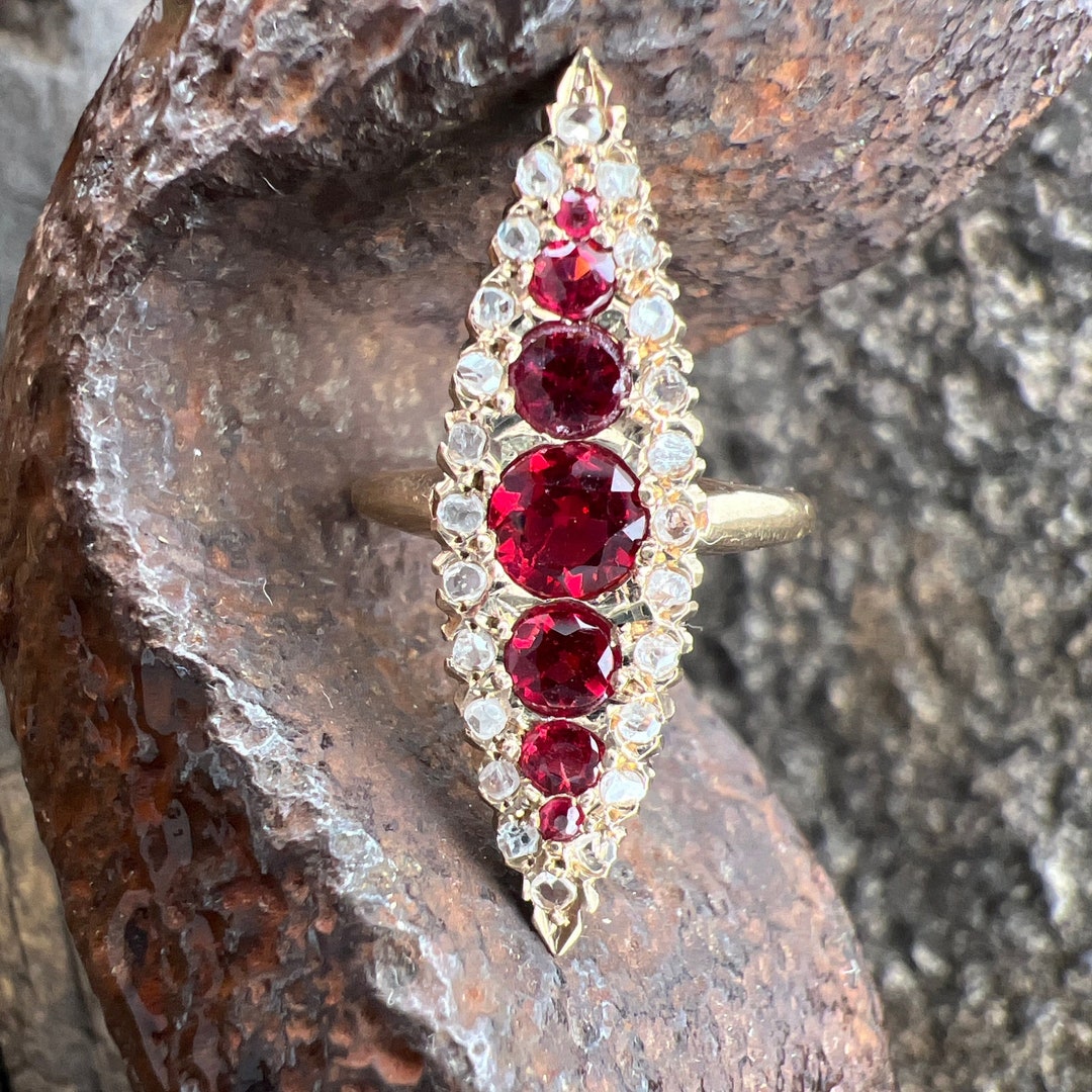 Vintage Estate Ruby and Diamond Halo Navette 10k Yellow Gold Ring