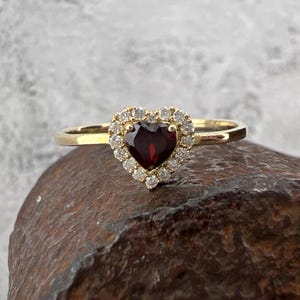 10K Garnet Heart surrounded by Diamonds Yellow Gold Ring - US Size 6.75