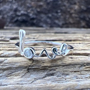 10k White Gold Love Ring with a Diamond - US 6.25
