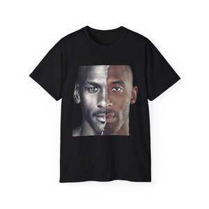 May include: Black t-shirt featuring a graphic of Michael Jordan and Kobe Bryant's faces combined.