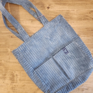 Sac en cordon large fait main bleu clair avec 5 poches intégrées