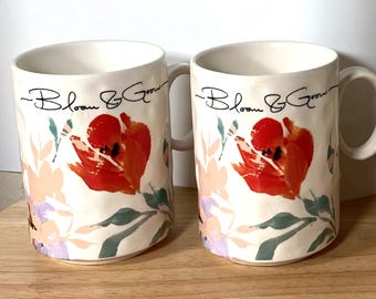 ANTHROPOLOGIE Brynne "Bloom & Grow'' Coffee Mug - Set of 2, Purple Leave, Orange Flower, NEW