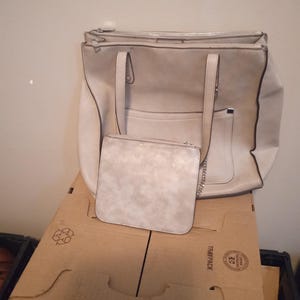 beige Kelly and Kate large tote style top handle bag with matching wallet