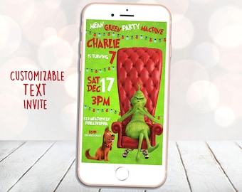 May include: A green Grinch character sits on a red throne with a dog beside him. The text on the phone screen reads "Mean Green Party Machine, Charlie is turning 7, Sat Dec 17, 3PM, 123 Meadow Ln, Philadelphia, RSVP 215555555".