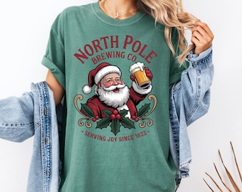 Comfort Colors North Pole Brew Company Christmas Shirt | Santa Claus Beer Logo Tee | Vintage Holiday Graphic Shirt | Cozy Festive Gift