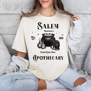 Camisa de Halloween de boticario de Salem con colores cómodos, camiseta de brujas de Salem, camiseta de gato negro
