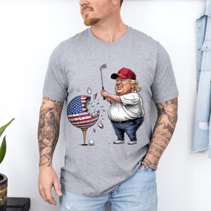 T-shirt unisexe balle de golf fracassant drapeau américain anti-atout, T-shirt politique sarcastique, T-shirt satire, T-shirt de protestation, T-shirt de résistance