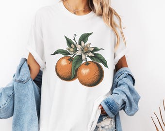 Koszulka z grafiką w kwiaty w stylu vintage - koszulka unisex z barwionego materiału, prezent dla miłośników natury, wygodna koszulka w kolorach pomarańczowym, kwiat pomarańczy, botaniczny