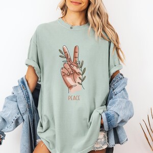 Peace Gesture Unisex T-Shirt, Graphic Tee for Casual Wear, Perfect for Gifts, Eco-Friendly Fashion, Relaxed Summer Style
