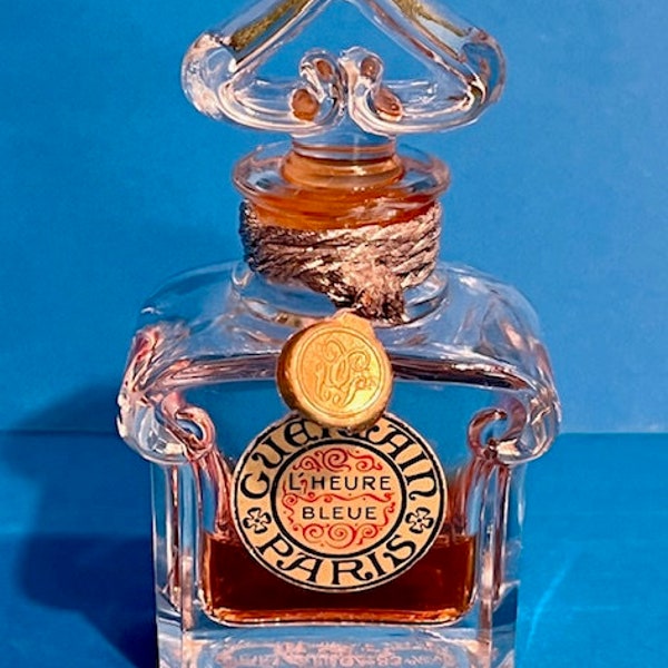 Guerlain L'Heure Bleue, empty perfume bottle, capacity 15ml, vintage. Slightly damaged at the top of the bottle on the right, see photo