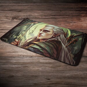 May include: A fantasy illustration of an elf with long white hair holding a bow and arrow. The elf is wearing green and brown clothing and is standing in a forest setting. The background is a blur of green and brown.