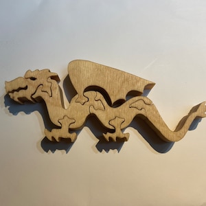 Wooden puzzle dragon handmade on scroll saw