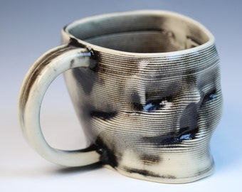 3D printed ceramic black and white stoneware skull mug