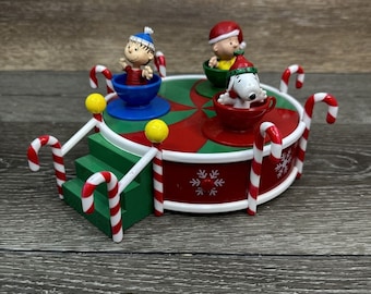 Vintage Peanuts United presenta Syndicate Christmas Merry Go Round Music