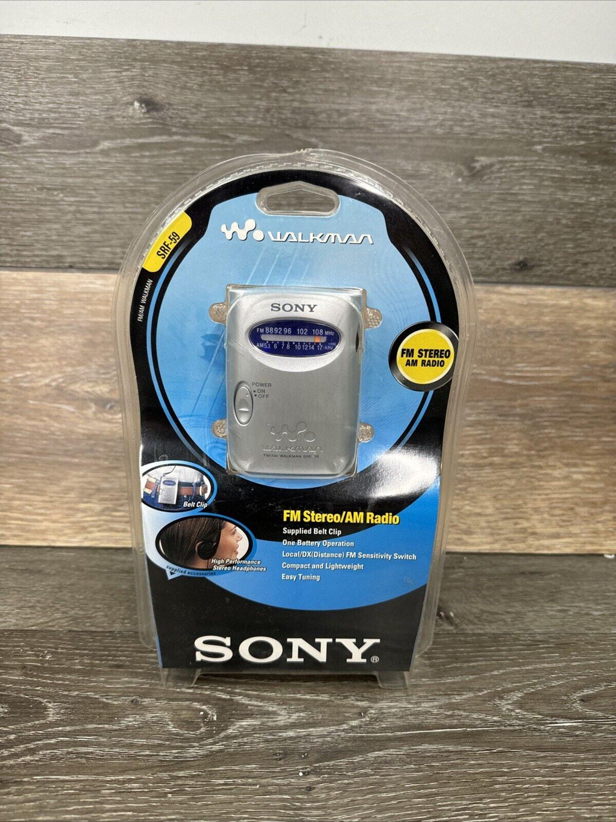 Sony SRF-59 AM/FM Walkman Radio Silver W/ Headphones/belt Clip 