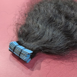 ナチュラルなインド産レミーの深いカーリーテープインヘアエクステンション