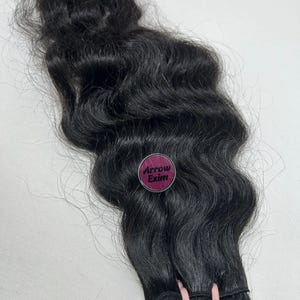 インドから最高品質の深めのカーリーヘアエクステンションを購入