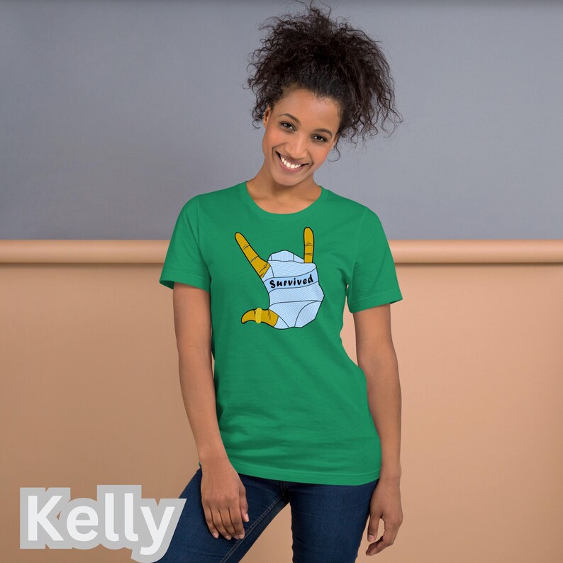 T-SHIRT - *Survived* Printed On A Combed and Ring Spun Cotton Unisex Short-Sleeved Top. FCK HMS. Kelly