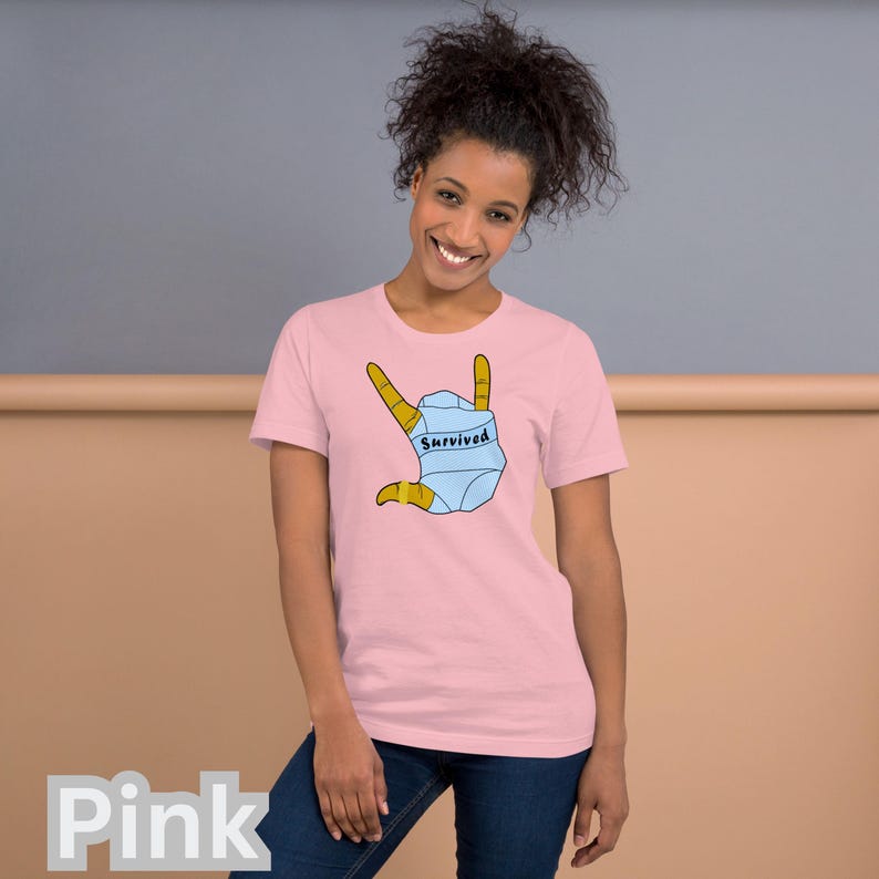 T-SHIRT - *Survived* Printed On A Combed and Ring Spun Cotton Unisex Short-Sleeved Top. FCK HMS. Pink