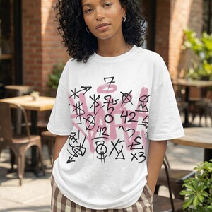 Women graphic tee design “Queen Mode” with pink crown and bold typography streetwear statement on white t-shirt