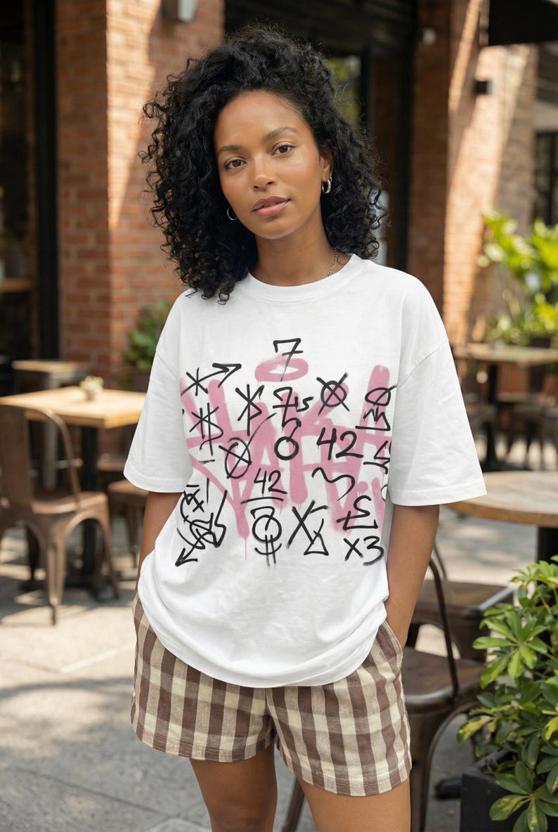 Women graphic tee design “Queen Mode” with pink crown and bold typography streetwear statement on white t-shirt