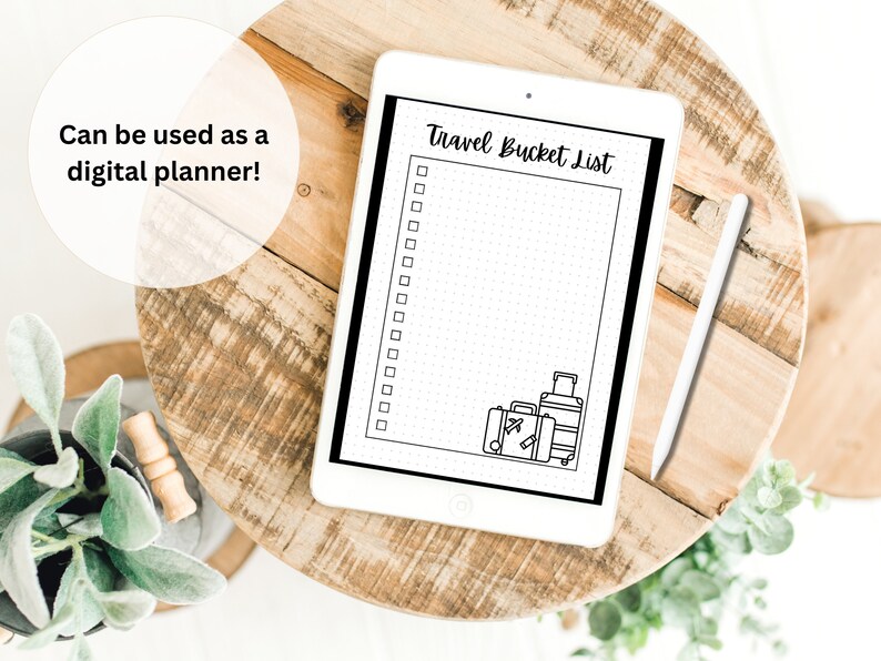 May include: A digital planner on a tablet with a white background. The planner has a black border and the text "Travel Bucket List" at the top. There are several checkboxes and a dotted line for writing. There are also drawings of suitcases at the bottom of the page.