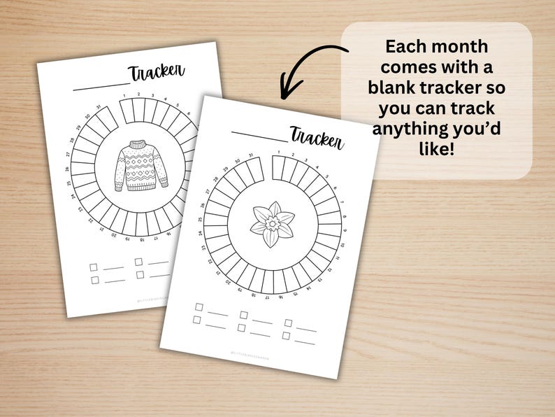 May include: Two white paper sheets featuring circular habit trackers labeled Tracker with numbers one through thirty-one. One sheet displays a sweater illustration in the center, while the other shows a flower. Text reads: Each month comes with a blank tracker so you can track anything you&rsquo;d like!