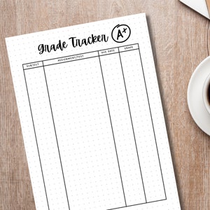 May include: A black and white printable grade tracker with the words "Grade Tracker" and "A+" in black text. The tracker has columns for subject, assignment/test, due date, and grade.