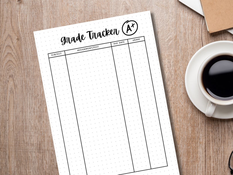 May include: A black and white printable grade tracker with the words "Grade Tracker" and "A+" in black text. The tracker has columns for subject, assignment/test, due date, and grade.