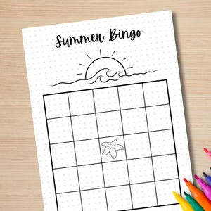 May include: A printable summer bingo card with a black and white illustration of a sun setting over waves at the top. The card has a 5x5 grid with blank squares.