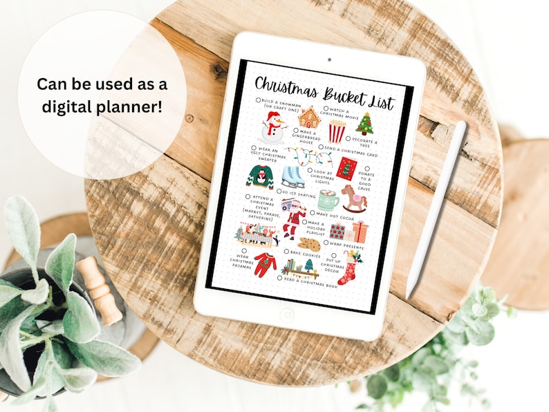 May include: A digital planner with a Christmas bucket list. The list includes activities like building a snowman, making a gingerbread house, decorating a tree, and reading a Christmas book.