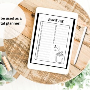 May include: A digital planner on a tablet with a bucket list template. The template has a bucket with stars and the text "Bucket List" at the top.