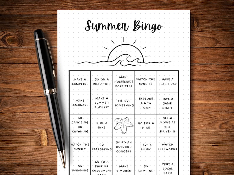 May include: A black and white printable summer bingo card with a sun and waves graphic at the top. The card has 25 squares with summer activities to check off, such as "Go Canoeing or Kayaking", "Make Lemonade", "Go to a Fair or Amusement Park", and "Watch Fireworks".