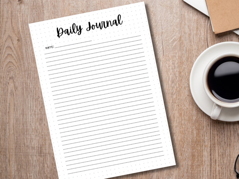 May include: A blank white daily journal with a black title "Daily Journal" and the word "Date:" followed by a blank line for writing the date.