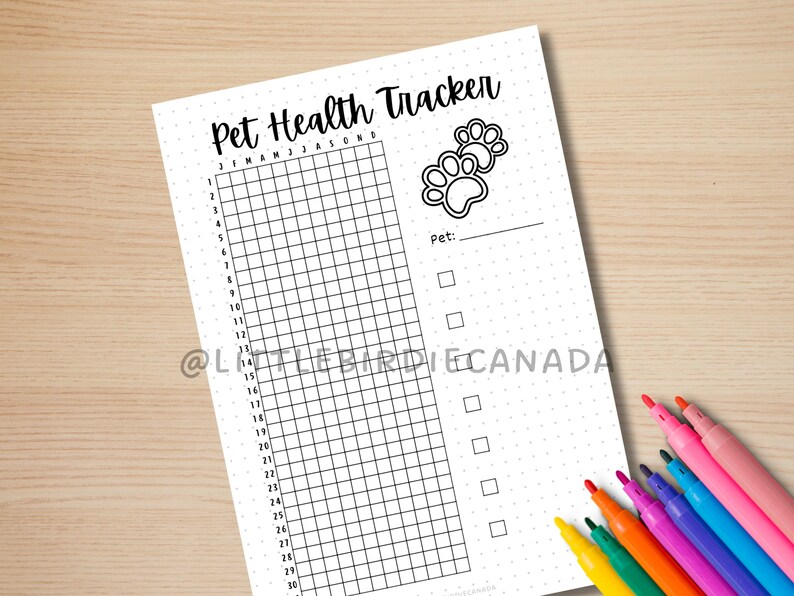 May include: A printable pet health tracker with a grid for recording daily health information. The tracker has a paw print design and the text "Pet Health Tracker" at the top.