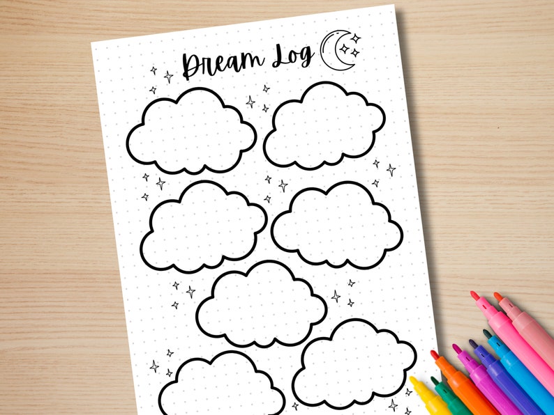 May include: A white Dream Log journal page with a dotted grid, featuring cloud outlines for recording dreams. The page includes the text "Dream Log" with a moon and star graphic. Colorful markers are visible in the corner.