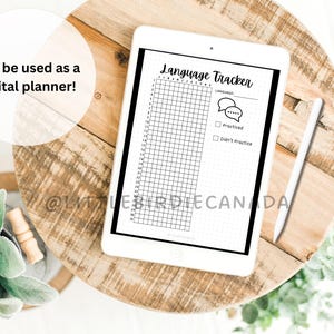 May include: A black and white printable language tracker with a grid for 30 days and checkboxes for "practiced" and "didn't practice". The text "Language Tracker" is at the top of the page.