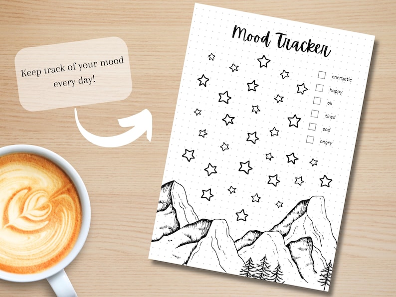 May include: A black and white printable mood tracker featuring a mountain range and stars. The tracker includes a checklist of moods: energetic, happy, ok, tired, sad, and angry.