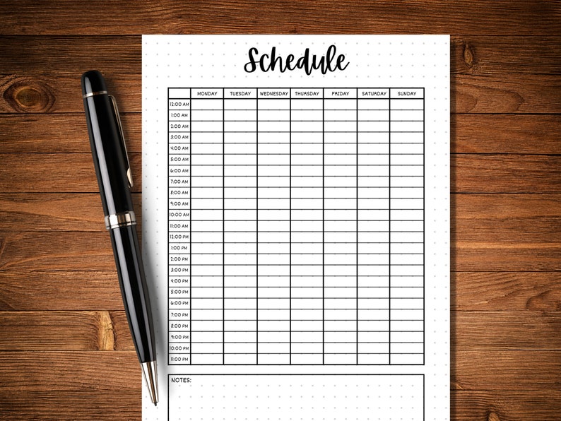 May include: A black and white printable daily schedule planner with a dotted background. The planner includes a section for notes at the bottom.