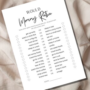 May include: A printable "Mommy Would Rather" game with a list of 16 questions and two choices for each question. The game is designed for a baby shower or other celebration.