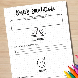 May include: A printable daily gratitude journal with sections for morning and night. The journal includes prompts for "Today's Affirmation", "I'm Looking Forward To", and "I'm Grateful For".