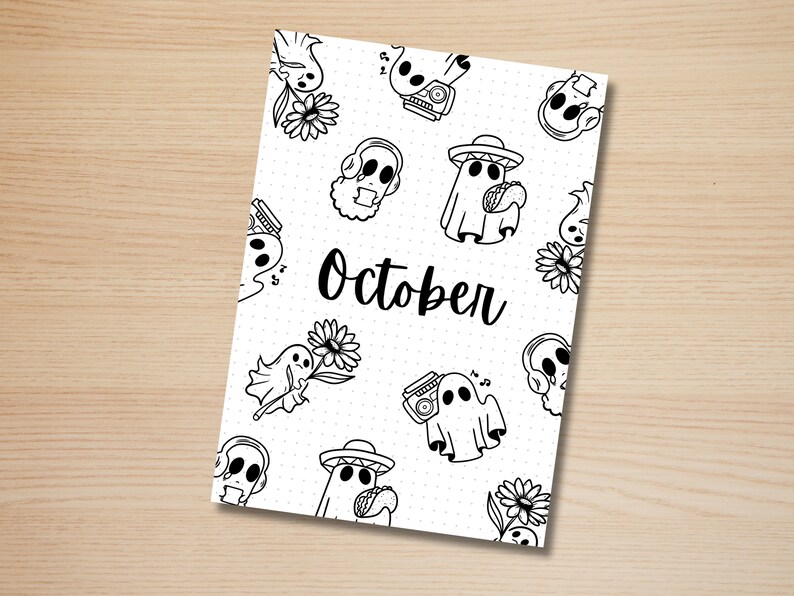 May include: A black and white printable planner page with a dotted background and a repeating pattern of ghosts, flowers, and cassette tapes. The text "October" is written in the center of the page.