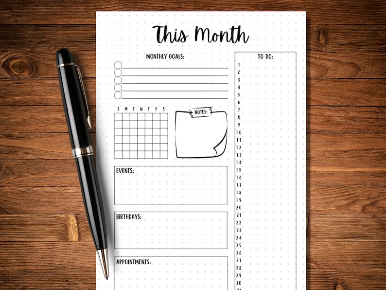 May include: A black and white printable planner page with the title "This Month". The page includes sections for monthly goals, to do, events, birthdays, and appointments. There is also a calendar grid and a notes section.