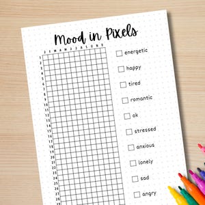 May include: A printable mood tracker with a grid of 28 squares for each month of the year. The grid is labeled with the months January through December.  The tracker also includes a list of moods to track, including energetic, happy, tired, romantic, ok, stressed, anxious, lonely, sad, and angry.